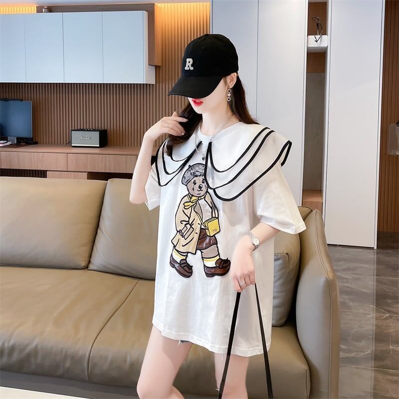 カレッジスタイルのゆったりとしたウエスタンスタイルのネイビーカラー漫画柄Tシャ<F-2897>