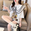 カレッジスタイルのゆったりとしたウエスタンスタイルのネイビーカラー漫画柄Tシャ<F-2897>