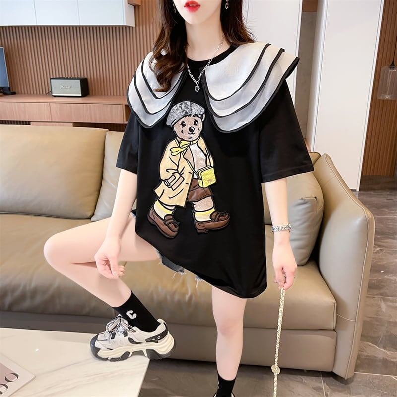 カレッジスタイルのゆったりとしたウエスタンスタイルのネイビーカラー漫画柄Tシャ<F-2897>